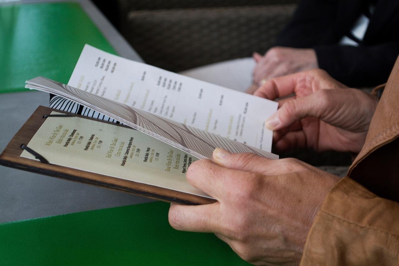 hand, table, menu, reading, menu, menu, menu, menu, menu